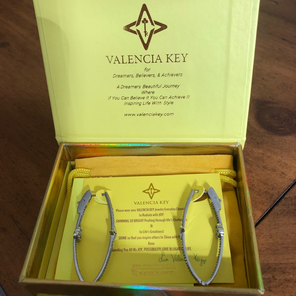 Valencia Key silver limitless hoop earrings